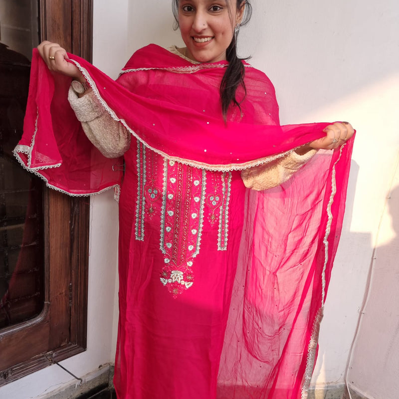 Red color suit with heavy neck work