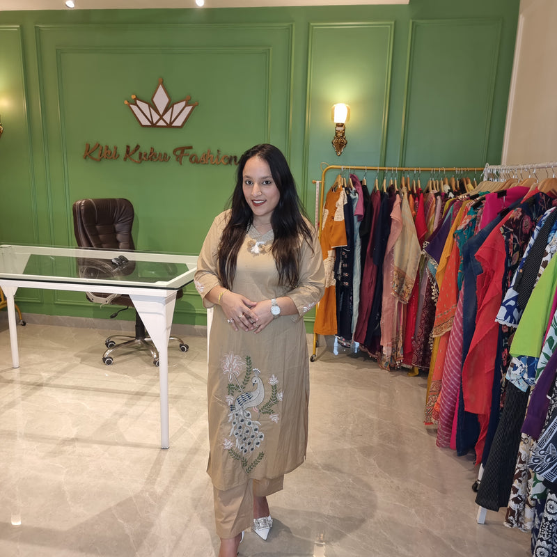 Beige peacock cordset